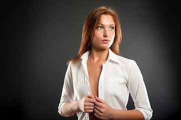 Image showing young sexy woman in white shirt