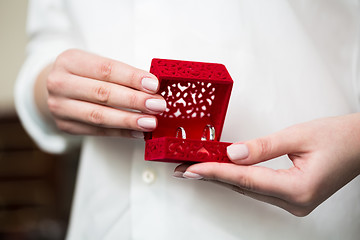 Image showing  Wedding Ring in Red Velvet Silk Box