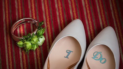 Image showing wedding shoes and bouquet 