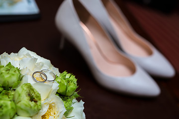 Image showing wedding shoes and bouquet 