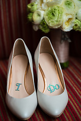 Image showing wedding shoes and bouquet 