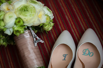 Image showing wedding shoes and bouquet 