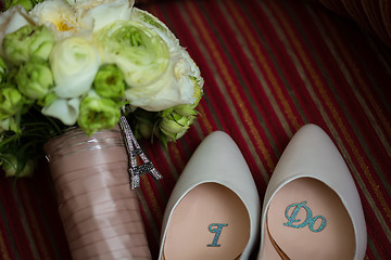 Image showing wedding shoes and bouquet 