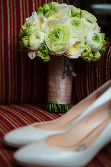 Image showing wedding shoes and bouquet 