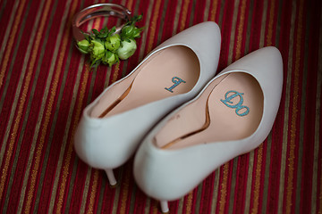 Image showing wedding shoes and bouquet 