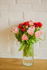 Image showing bouquet of tulips on white background for advertising