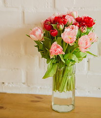 Image showing bouquet of tulips on white background for advertising