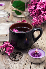 Image showing fragrant tea and a branch of lilac