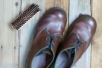 Image showing vintage boots brush and shoe polish