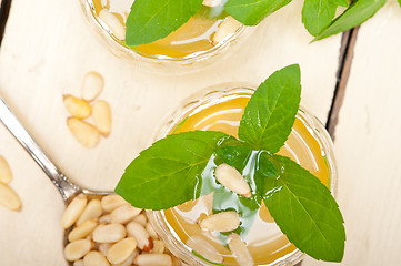 Image showing Arab traditional mint and pine nuts tea