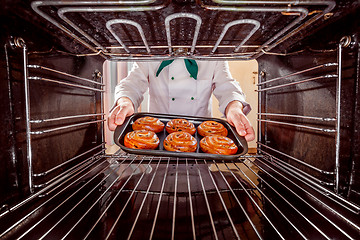 Image showing Chef cooking in the oven.