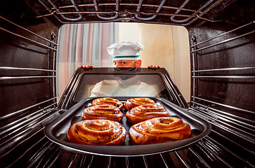 Image showing Chef cooking in the oven.