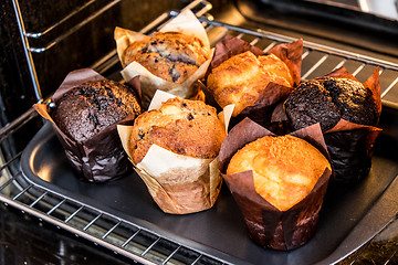 Image showing Muffins in the oven