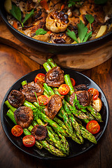 Image showing Green asparagus salad with roasted mushrooms