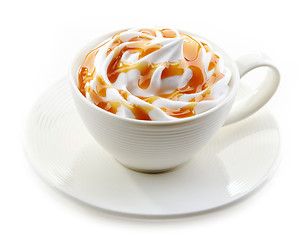 Image showing cup of caramel latte with whipped cream