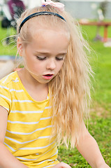 Image showing Portrait of beautiful playing little girl