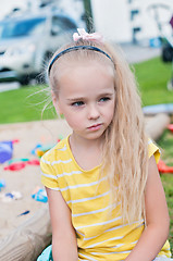 Image showing Portrait of beautiful sad little girl