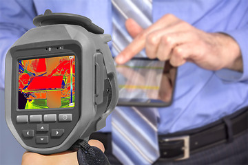 Image showing Recording Businessman With Thermal Camera