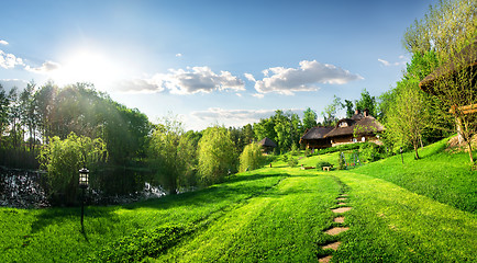 Image showing Houses of log and landscape