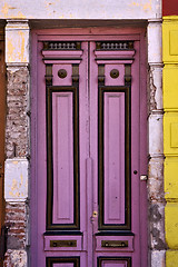 Image showing black violet wood old door in the centre of la boca 