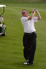 Image showing Male golfer playing