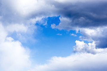 Image showing Gentle blue cloudy sky frame