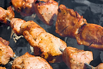 Image showing Shashlik over charcoal.