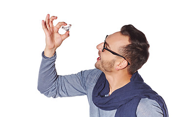 Image showing Man examining big diamond