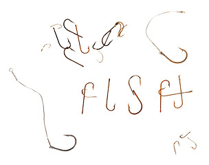 Image showing Word F I S H and old rusty fish hooks