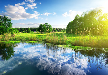 Image showing Clouds in river