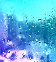 Image showing Texture of natural water drops on glass