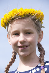 Image showing young girl portrait in yellow dandelion garland