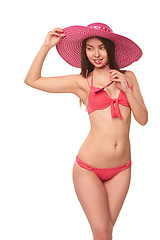 Image showing Woman in pink swimsuit and hat