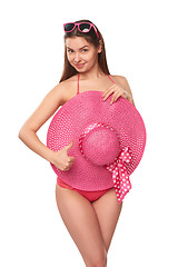 Image showing Woman in pink swimsuit and hat