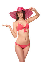 Image showing Woman in pink swimsuit and hat