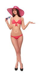 Image showing Woman in pink swimsuit and hat