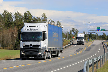 Image showing Two Mercedes-Benz Actros Trucks on the Road