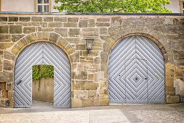 Image showing Two gates in a wall