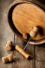 Image showing Corkscrew and wooden cask