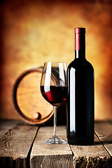 Image showing Wine on wooden table