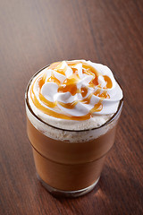 Image showing glass of caramel latte coffee