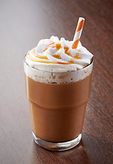 Image showing glass of caramel latte coffee