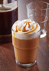 Image showing glass of caramel latte coffee
