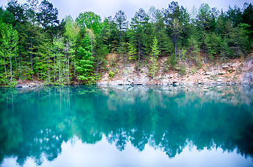 Image showing cloudy skies and reflections at a quarry