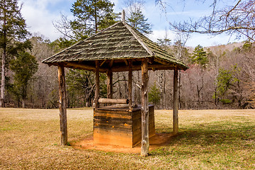 Image showing old historic water well in the forest