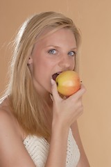 Image showing Woman with apple