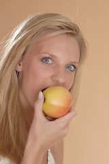 Image showing Woman with apple