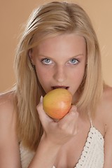 Image showing Woman with apple