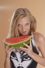 Image showing Woman with melon