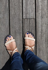 Image showing female legs in sandals